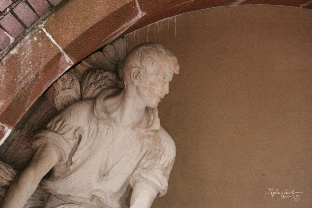 Close up of a statue's torso, inside a brick arch. How to spend a day in Bristol, England. This Splendid Shambles. 