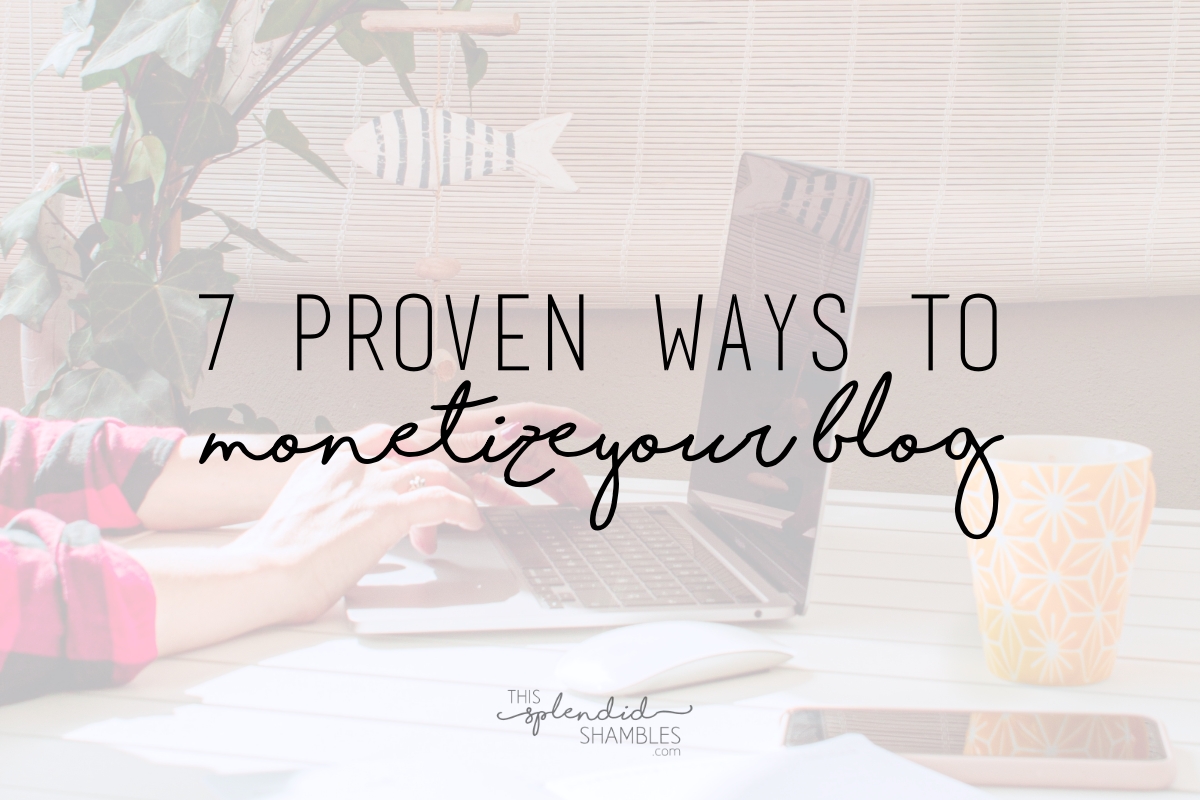 Woman typing at a laptop, with a mug next her her. White opacity over the top. 7 proven ways to monetize your blog.