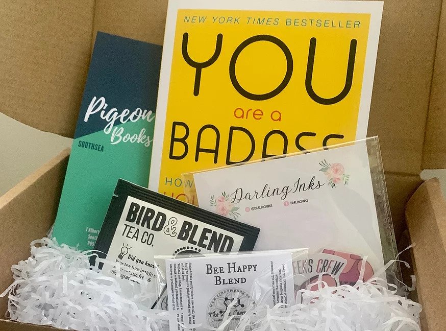 You Are a Badass book and other goodies displayed in a box.