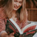 Nikki from The Bookish Mindset reading a book.
