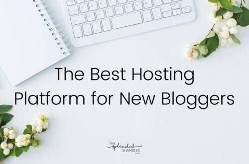 Flat lay of a desk with keyboard notebook and flowers. The best hosting platform for new bloggers - Lyrical Host - This Splendid Shambles
