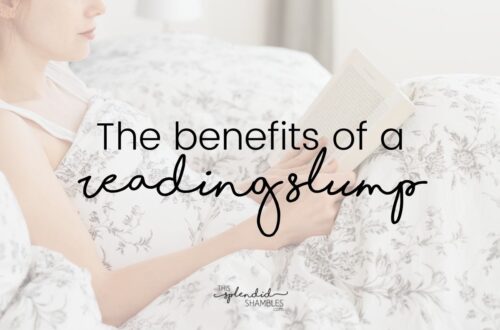 Woman sitting in bed with a book, but the image is low opacity. 'The benefits of a reading slump' is in black writing over the top.