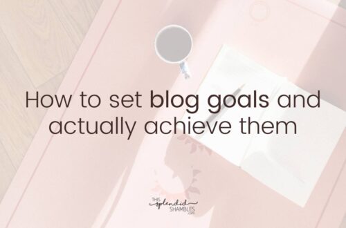 Pinkish hue of a table with notebook and coffee cup on it, with the words 'How to set blog goals and actually achieve them' on top.